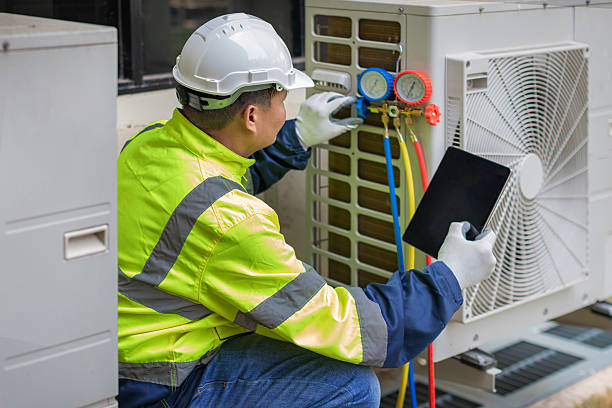 Professional Air Conditioning Repair technician working in Conesville, OH
